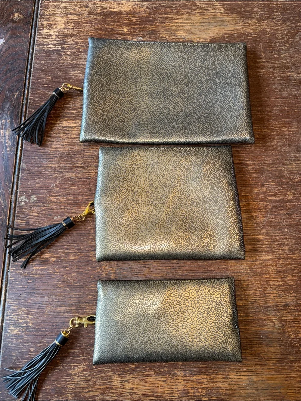 EUC Set of 3 gold Makeup Junkie Bags - mini, small, & medium like new condition
